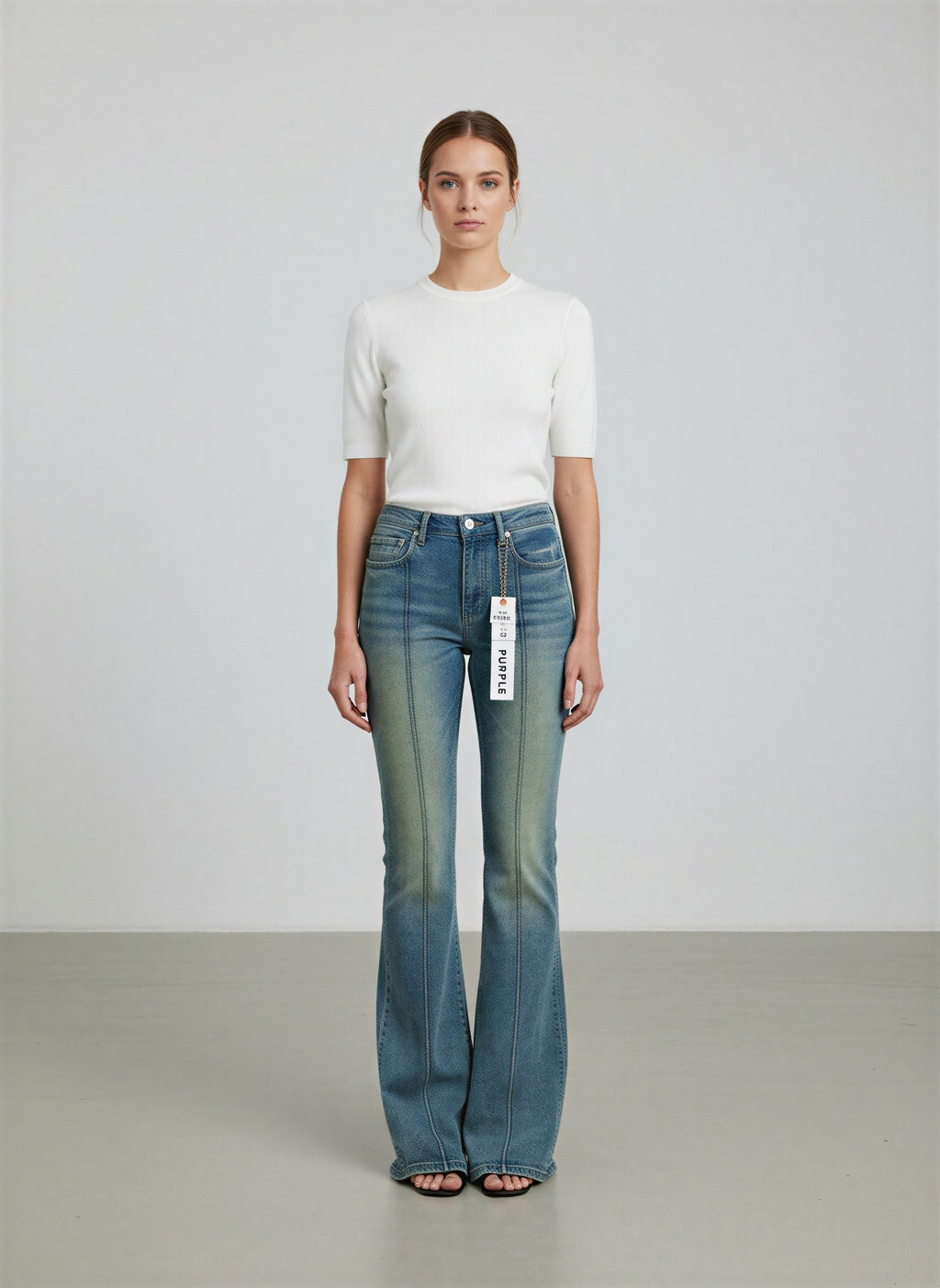 Faded wash denim jeans with a classic relaxed fit and vintage-inspired look