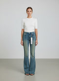 Faded wash denim jeans with a classic relaxed fit and vintage-inspired look