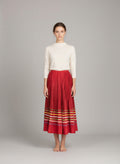 Classic red skirt available in small, medium, and large sizes displayed on a clean background